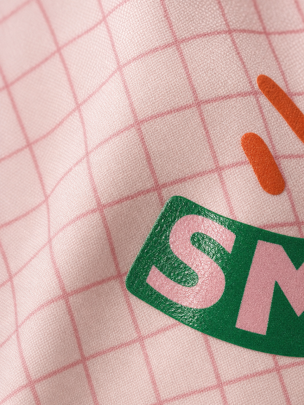 OFF SUPPLY SMILE SHIRT IN PINK – close-up detail