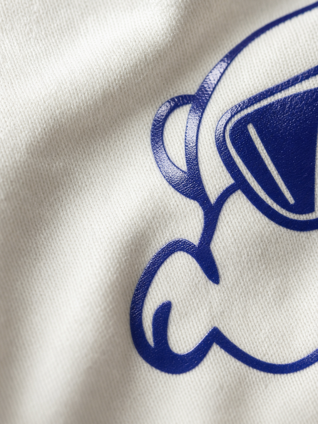 A GIRL OFF SUPPLY T-SHIRT – close-up detail