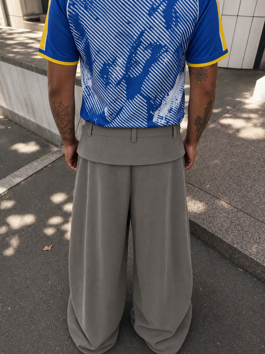 Off Supply Horizon Gray Trousers – model back
