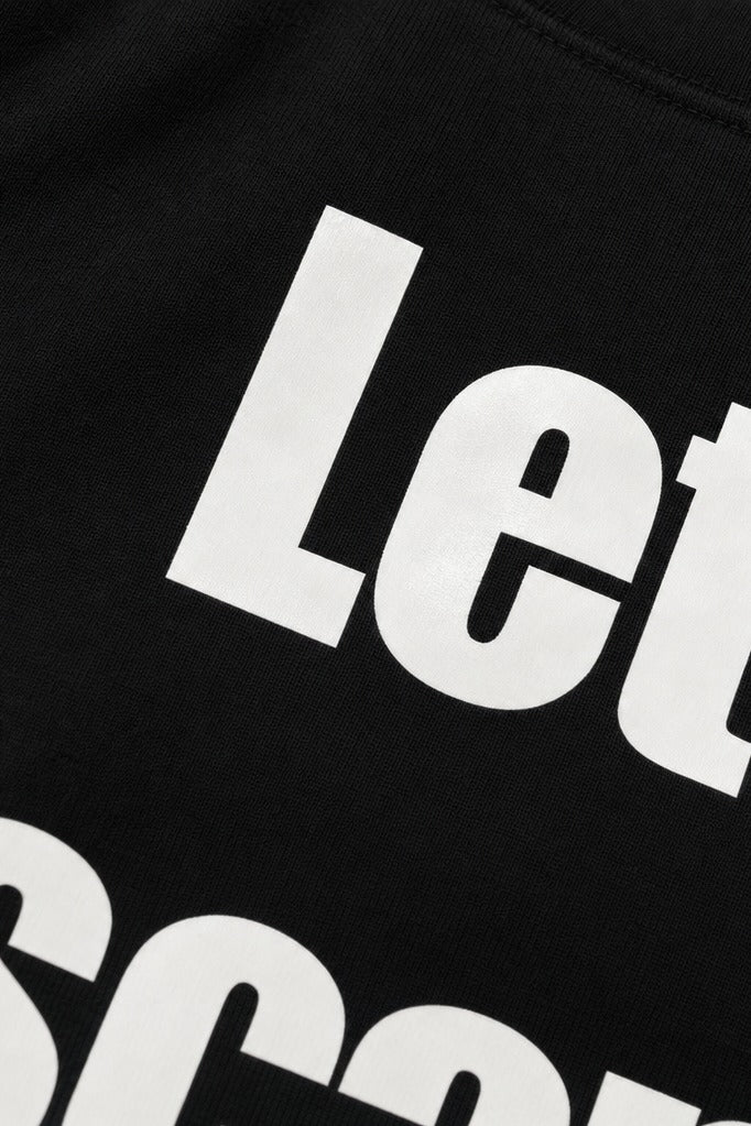 Close-up fabric detail - Off supply Escape From Reality black t-shirt