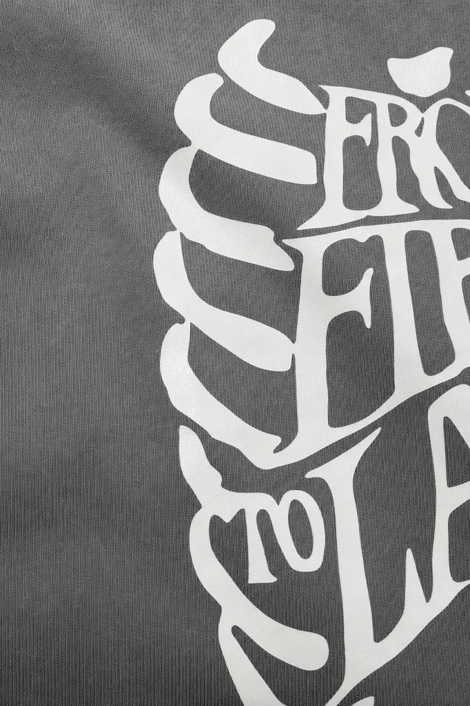 Close-up fabric detail - Off supply From First to last grey t-shirt