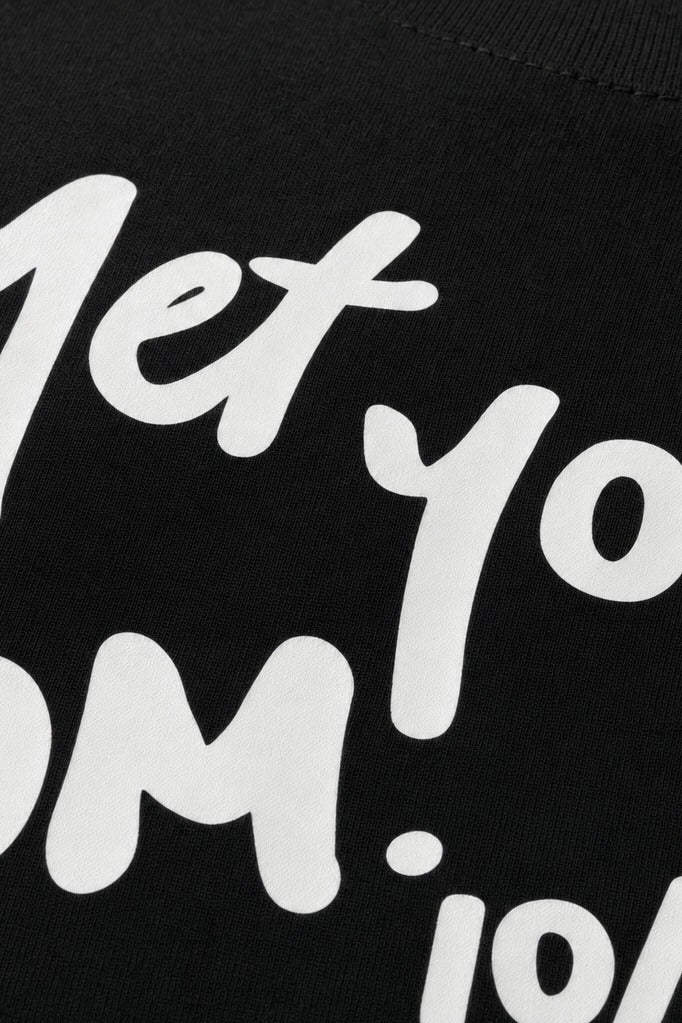 Close-up fabric detail - Off supply Met your Mom black t-shirt
