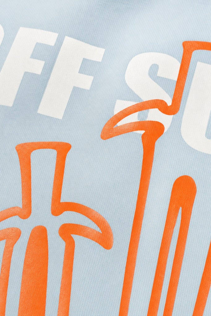 Close-up fabric detail - Off supply Orange Dagger light blue t-shirt