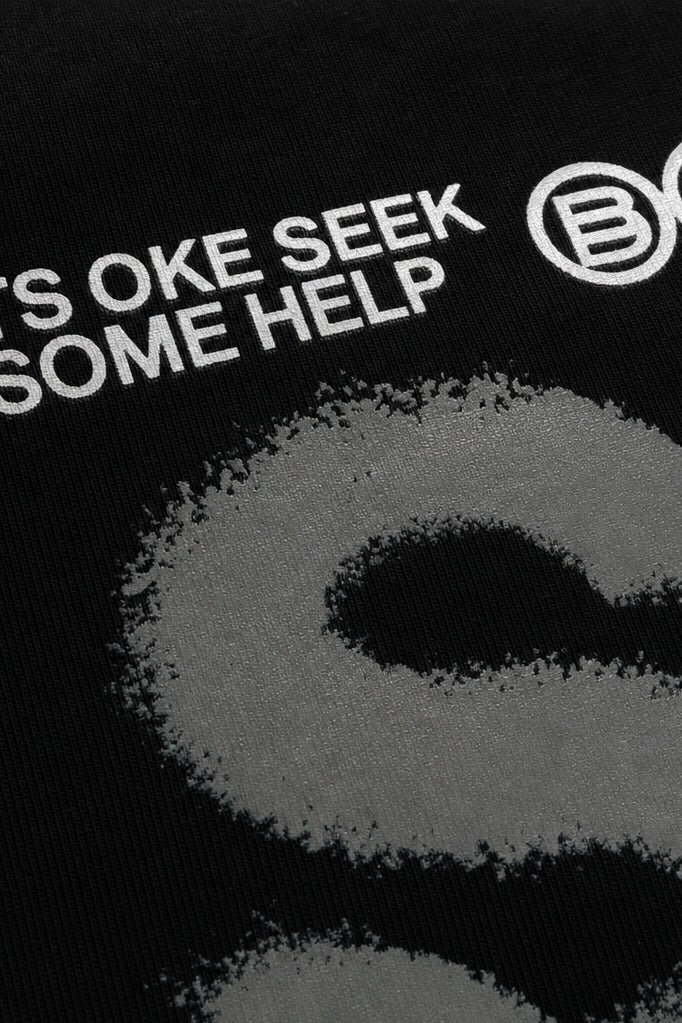 Close-up fabric detail - Off supply SOS Black T-shirt