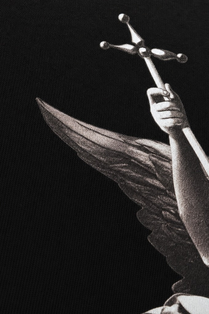 Close-up fabric detail - Off Supply Winged Relic Statement T-shirt