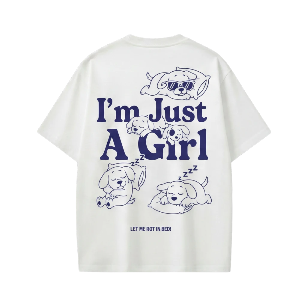 Off Supply white 100% cotton t-shirt with oversized fit and navy graphic of dogs sleeping and text "I'm Just A Girl".